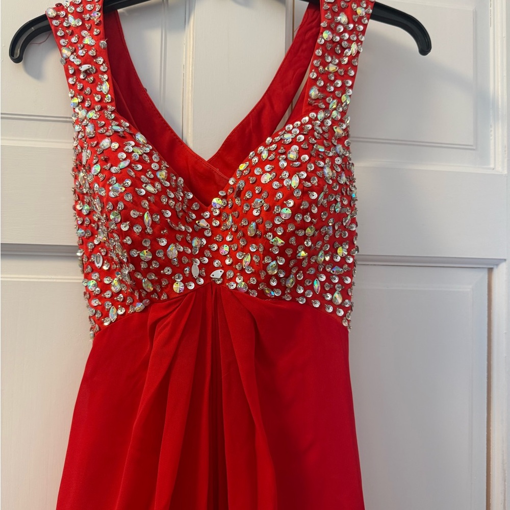 Red Sleeveless Dress with Sequin Embellishments